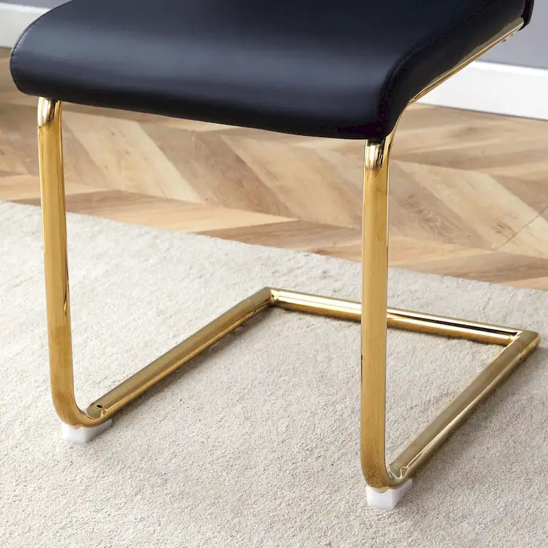 Set di sedie da pranzo in PU, sedie da pranzo nere dal design unico, materiale in PU, abbinate a gambe in metallo dorato (set da 4)