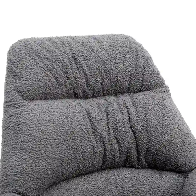 Sedia a dondolo con seduta imbottita capitonné rivestita in Bouclé