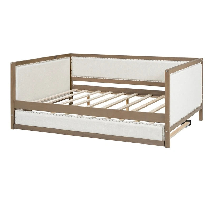 Letto a una piazza e mezza imbottito con letto estraibile e decorazione con borchie
