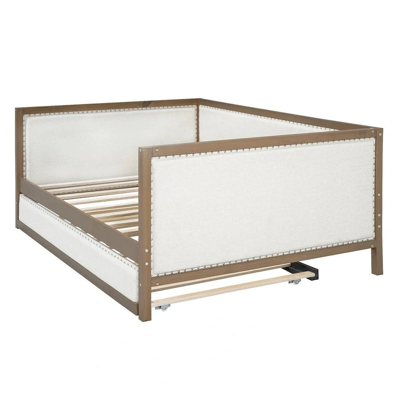Letto a una piazza e mezza imbottito con letto estraibile e decorazione con borchie