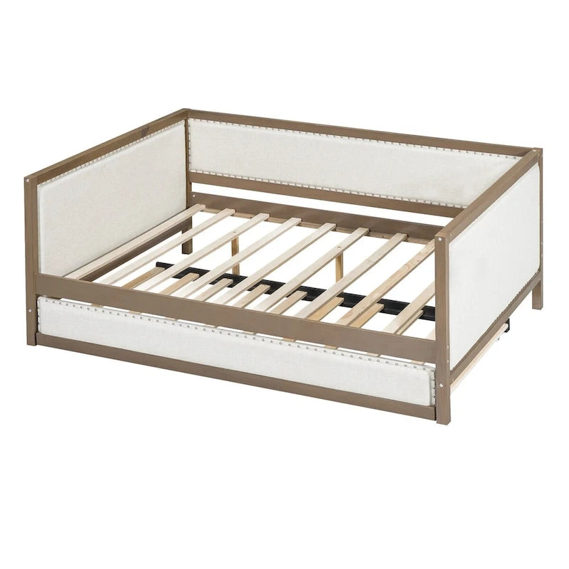 Letto a una piazza e mezza imbottito con letto estraibile e decorazione con borchie