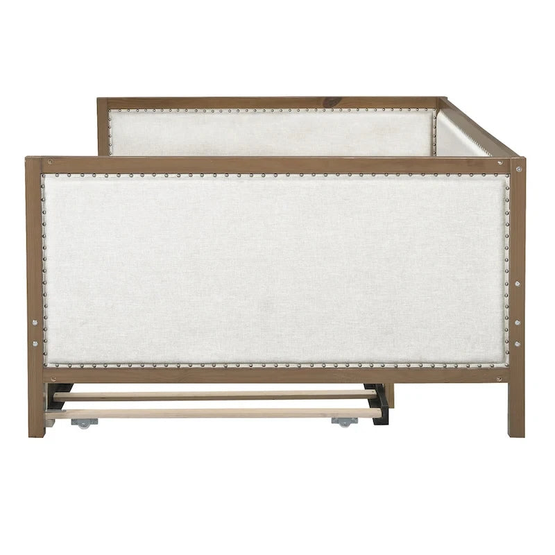Letto a una piazza e mezza imbottito con letto estraibile e decorazione con borchie