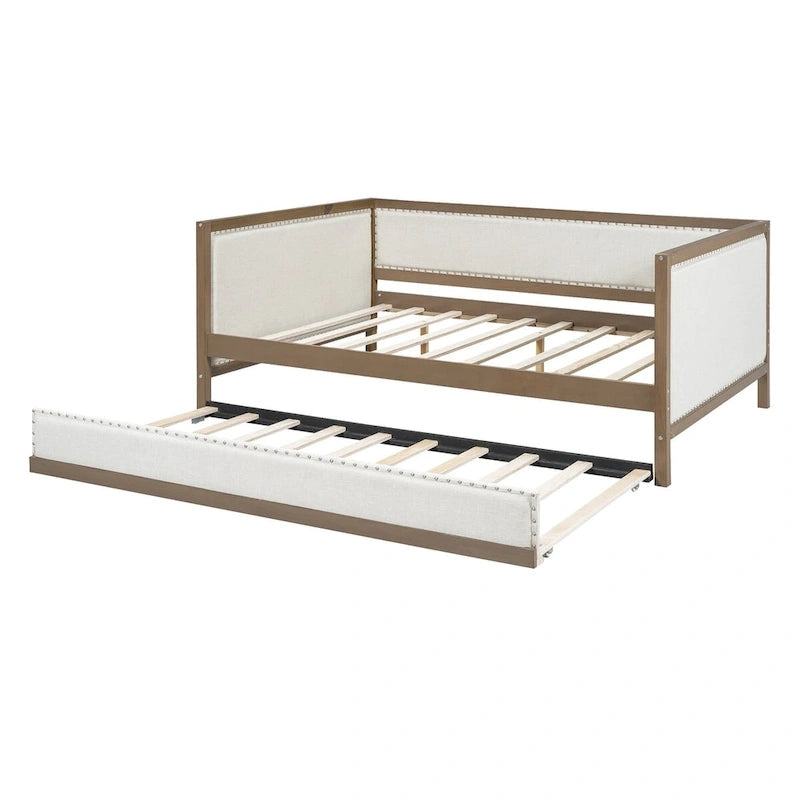 Letto a una piazza e mezza imbottito con letto estraibile e decorazione con borchie