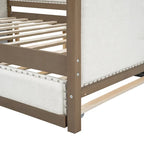 Letto a una piazza e mezza imbottito con letto estraibile e decorazione con borchie